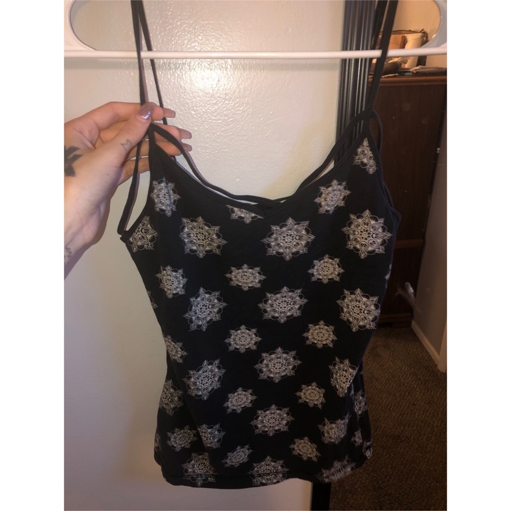 Black tank w cross straps.